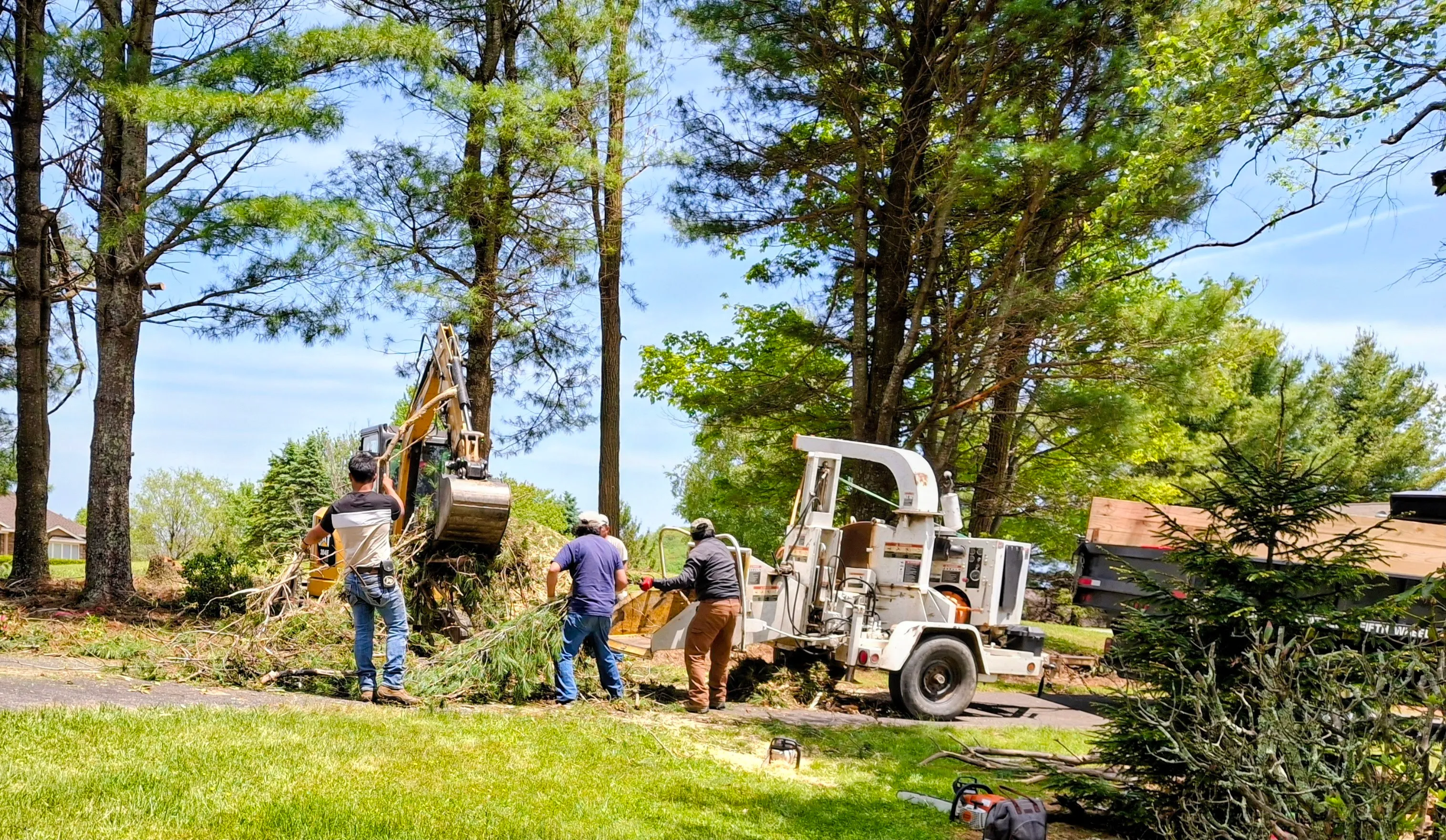 River Birch crew clearing a lot with equipment in Watauga County, NC